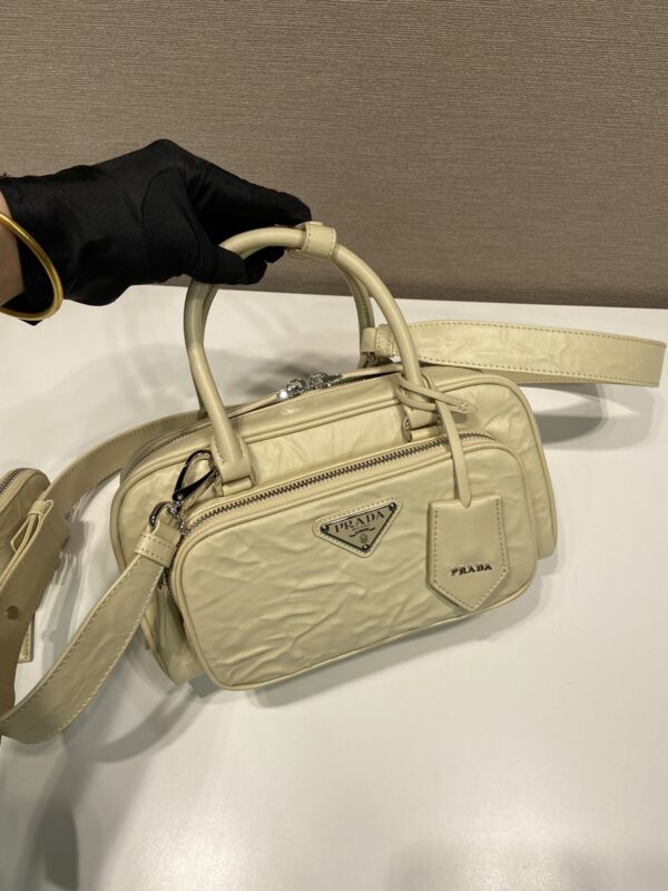 Prada Antique nappa leather multi-pocket top-handle bag