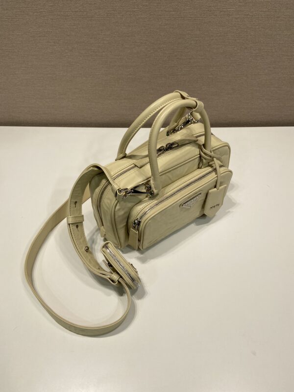 Prada Antique nappa leather multi-pocket top-handle bag