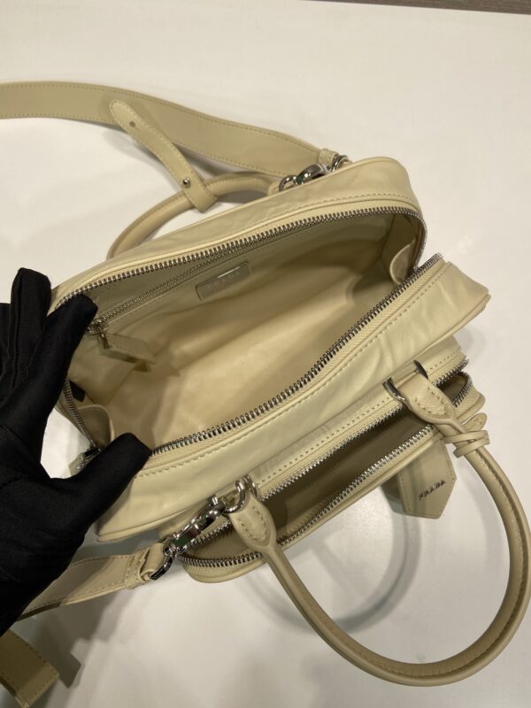 Prada Antique nappa leather multi-pocket top-handle bag