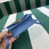 Prada Saffiano leather card holder with shoulder strap