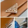 Prada Embl??me brushed-leather bag