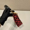 Prada Embroidered jacquard fabric mini-bag