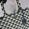 Large Prada Symbole embroidered fabric handbag