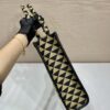 Large Prada Symbole embroidered fabric handbag