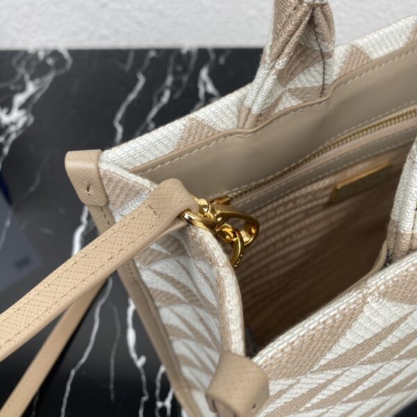 Small Prada Symbole embroidered fabric handbag