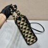 Small Prada Symbole embroidered fabric handbag