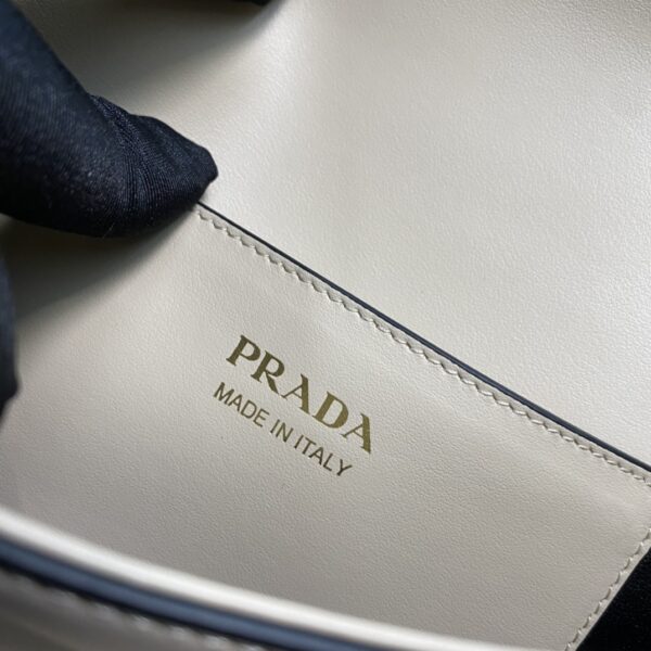 Prada Arqu?? Leather shoulder bag moon bag