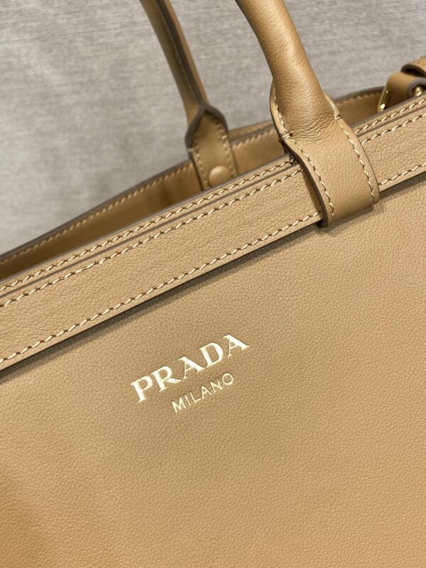 Prada Buckle medium leather handbag with double belt