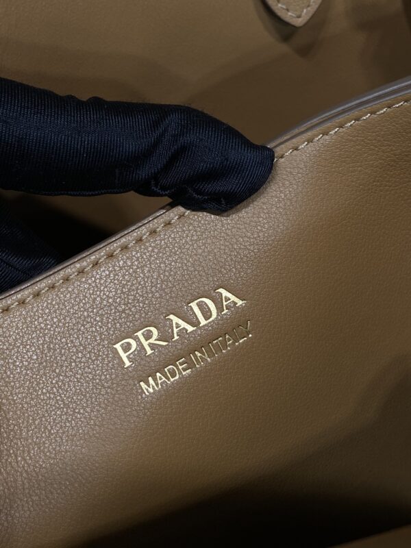 Prada Buckle medium leather handbag with double belt