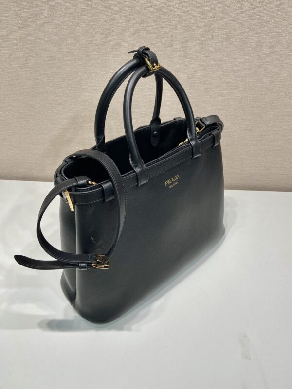 Prada Buckle medium leather handbag with double belt