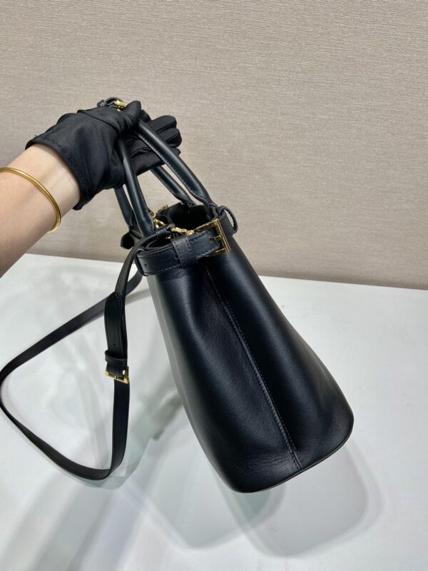 Prada Buckle medium leather handbag with double belt
