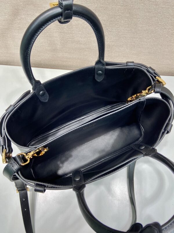 Prada Buckle medium leather handbag with double belt
