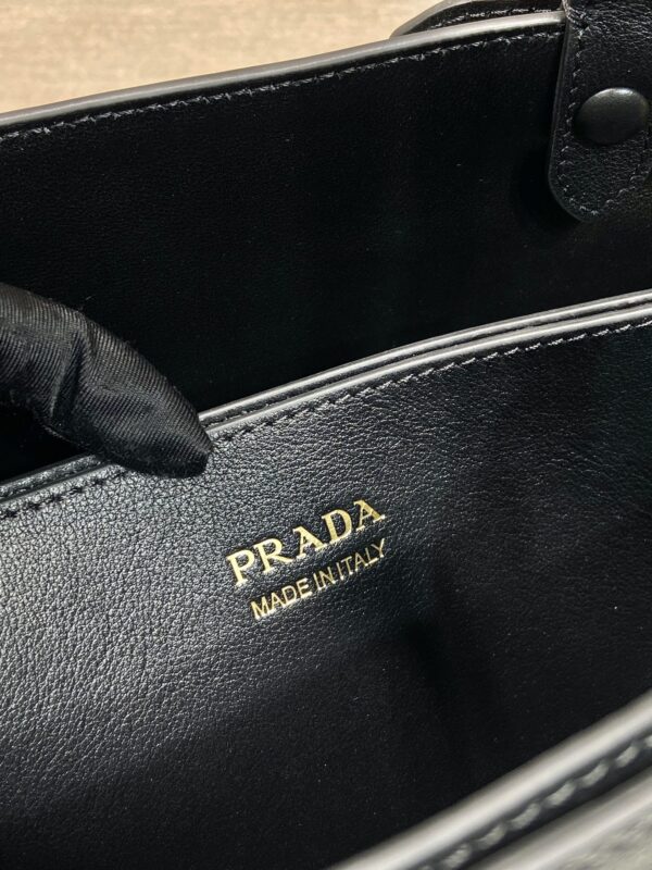Prada Buckle medium leather handbag with double belt