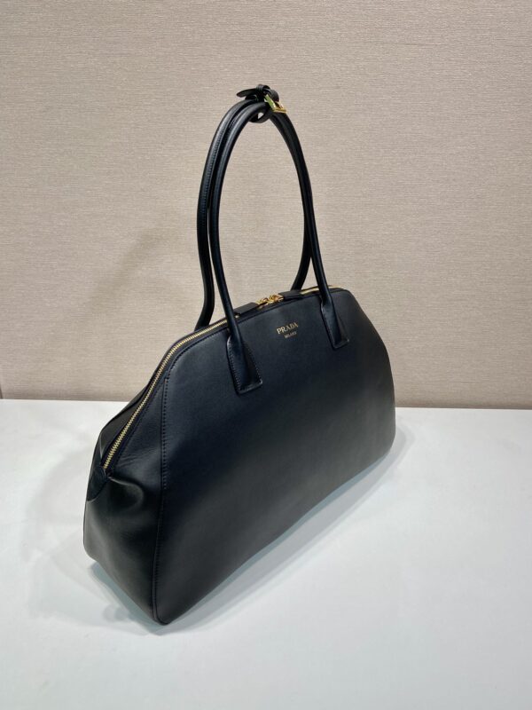 Large leather tote bag with zipper closure